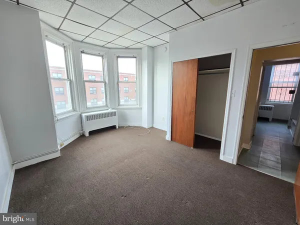 an empty room with windows