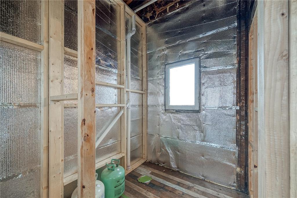 232 Chadwick Street Sewickley, PA 15143 - Photo 14 of 36 a bathroom with a glass shower door