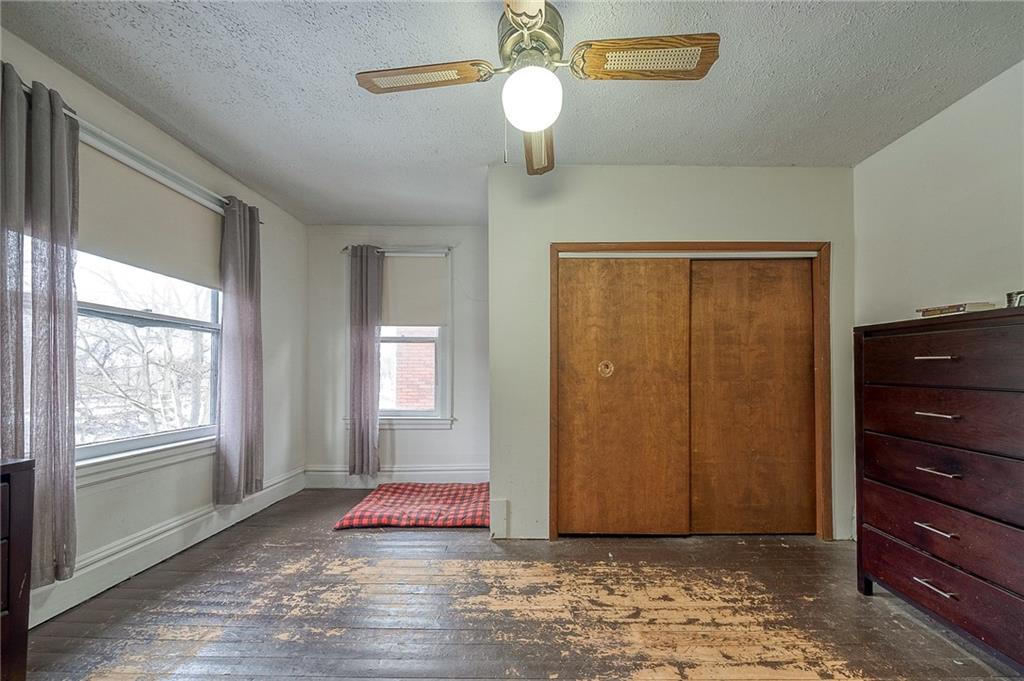 232 Chadwick Street Sewickley, PA 15143 - Photo 17 of 36 a view of a livingroom with wooden floor and window