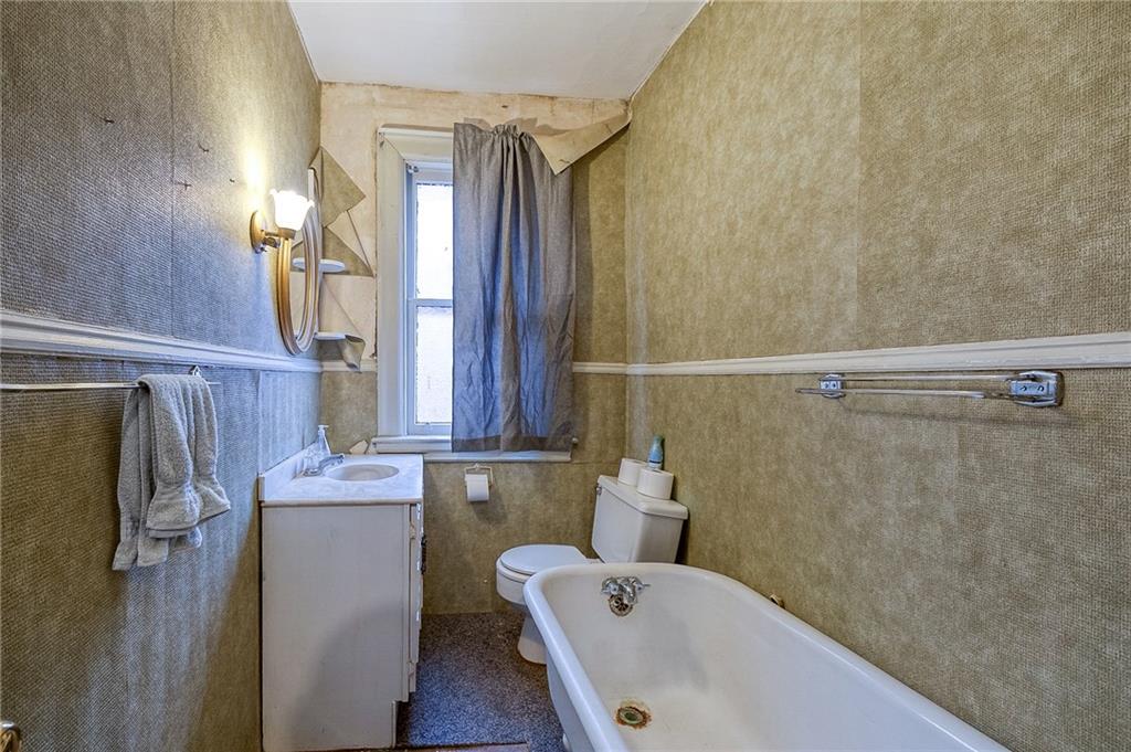 232 Chadwick Street Sewickley, PA 15143 - Photo 21 of 36 a bathroom with a sink and tub