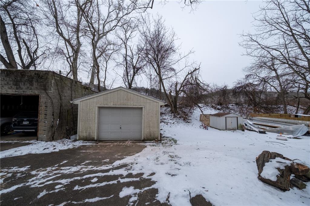 232 Chadwick Street Sewickley, PA 15143 - Photo 27 of 36 a view of a house with a snow in the road