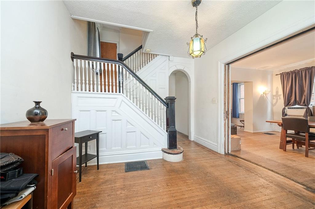 232 Chadwick Street Sewickley, PA 15143 - Photo 3 of 36 a view of entryway and hall with dining room