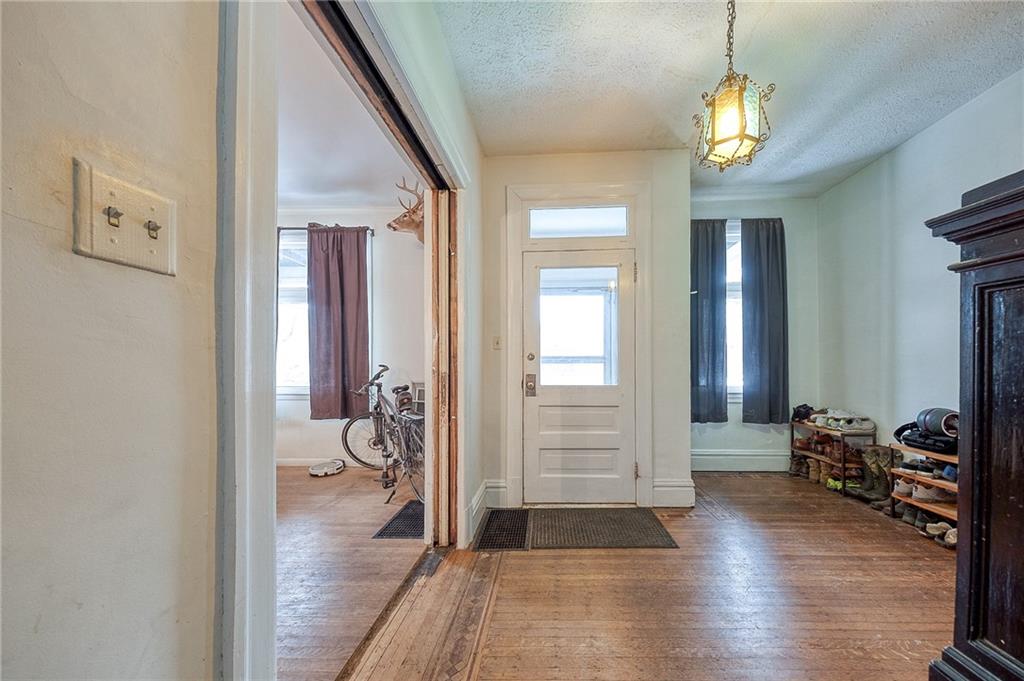 232 Chadwick Street Sewickley, PA 15143 - Photo 6 of 36 a view of a livingroom with furniture and hardwood floor