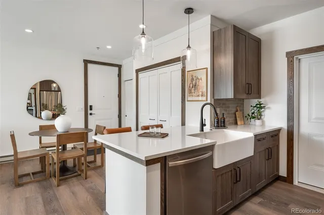 a bedroom with a bed couch and a window