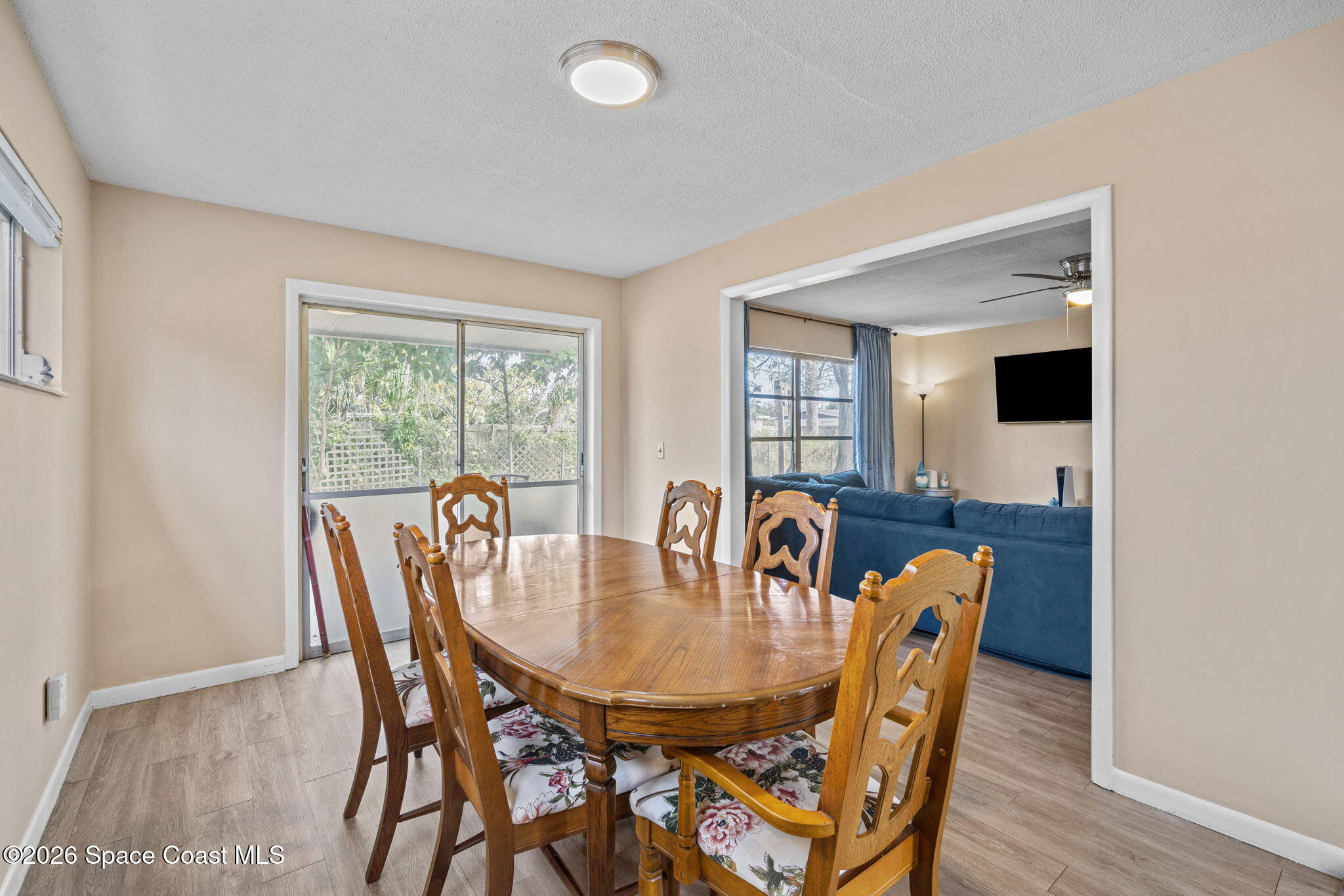 1088 Coronado Drive Rockledge, FL 32955 - Photo 14 of 23 a dining room with furniture and wooden floor