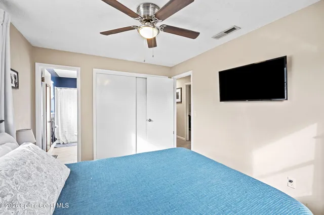 a view of a livingroom with a flat screen tv