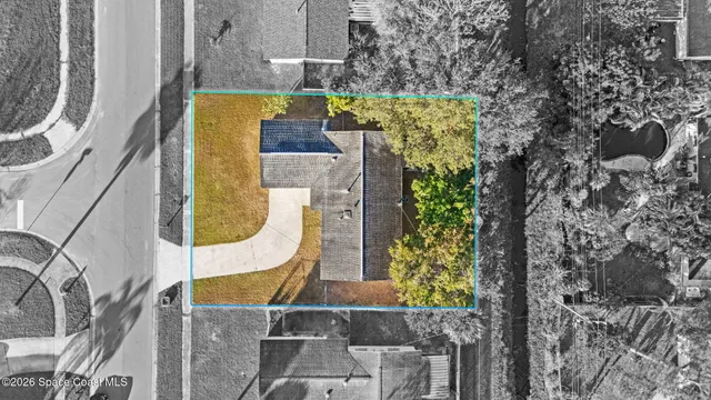 aerial view of a house with swimming pool