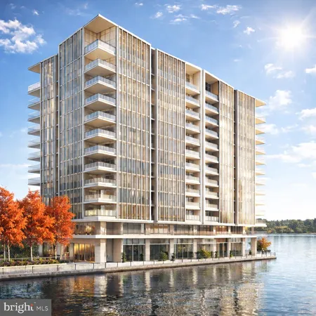 a front view of a building with lake view