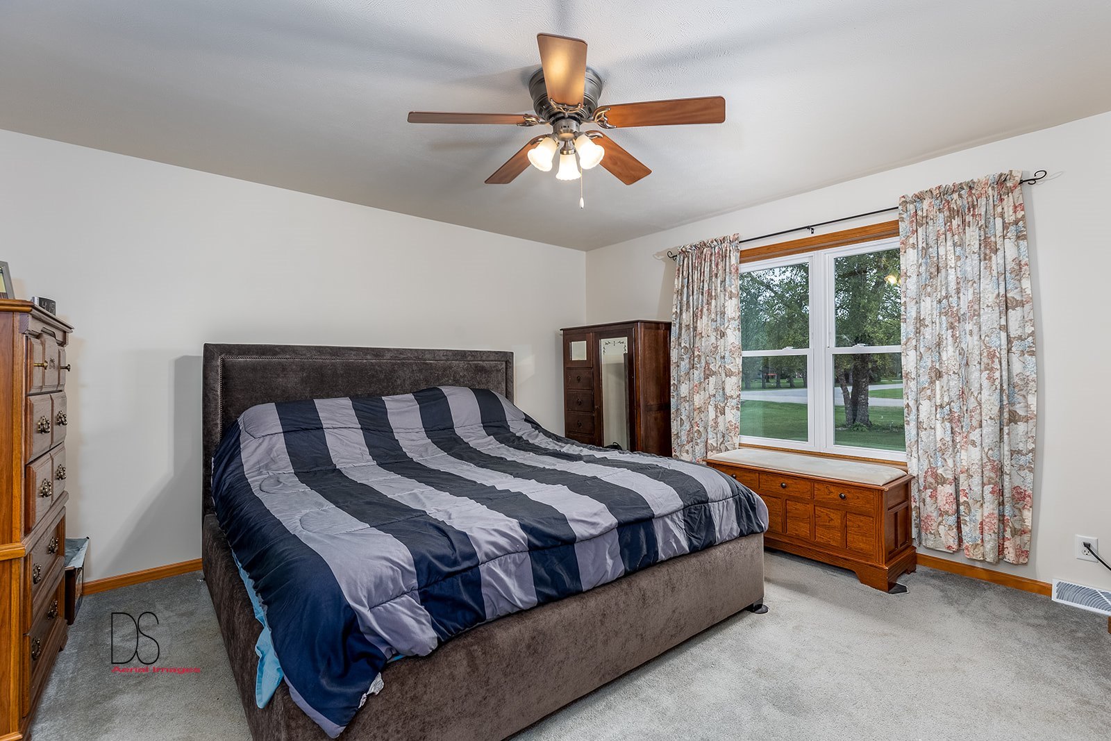 2994 East 1520th Road Ottawa, IL 61350 - Photo 12 of 30 a bedroom with a bed and a chandelier