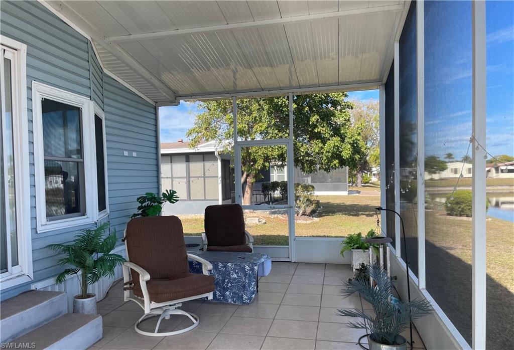 101 Oceans Boulevard, Unit 101 Naples, FL 34104 - Photo 14 of 14 a outdoor space with furniture