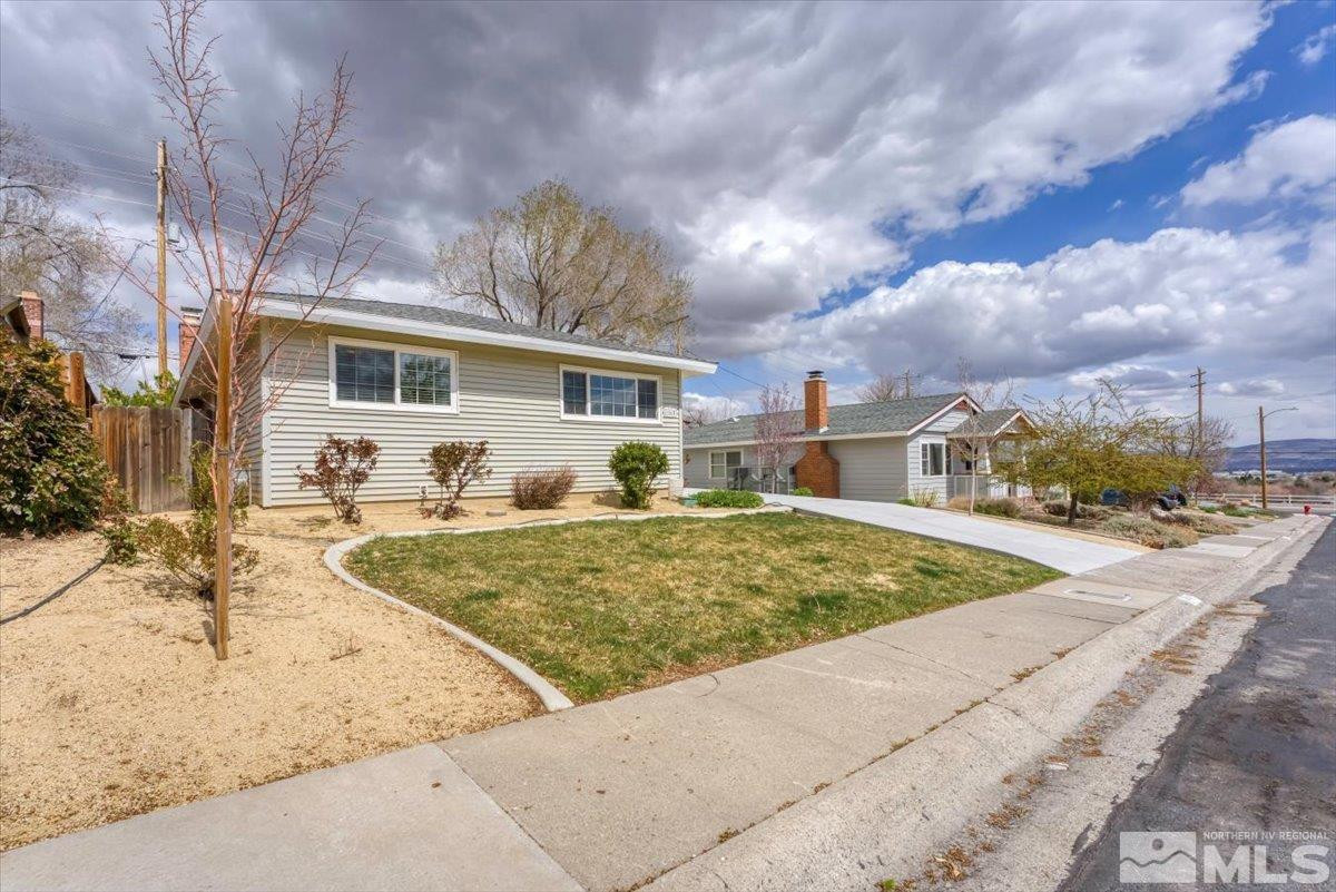 1865 Gridley Avenue Reno, NV 89503 - Photo 3 of 27 a view of a house with snow in the background