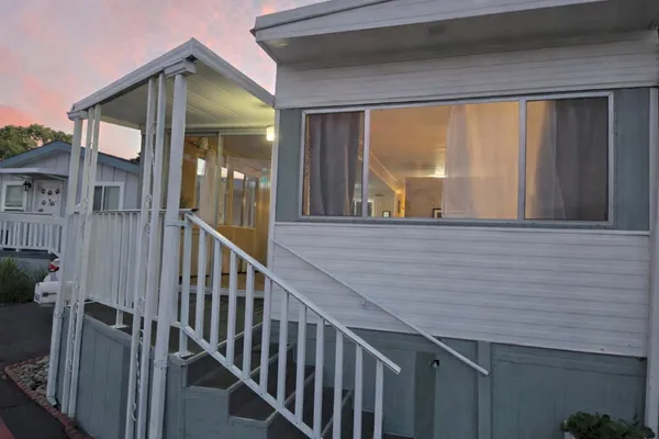 a view of a balcony with city view