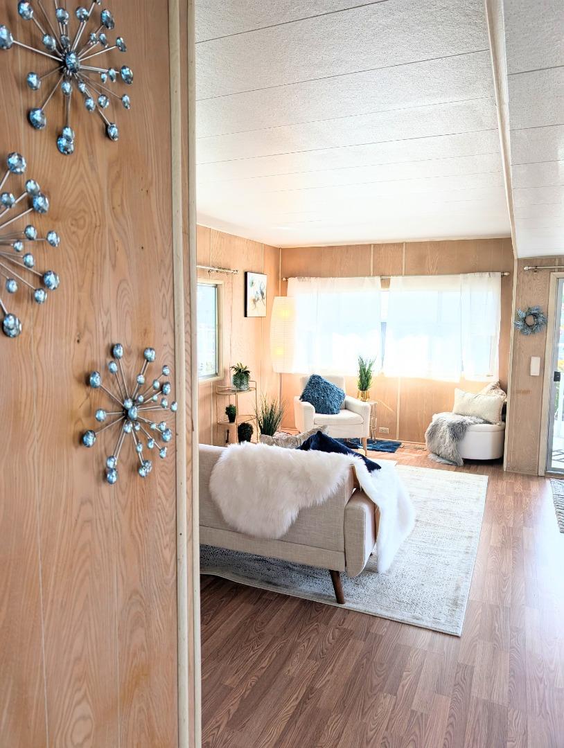 1201 Sycamore Terrace, Unit 148 Sunnyvale, CA 94086 - Photo 12 of 36 a bedroom with furniture and a large window