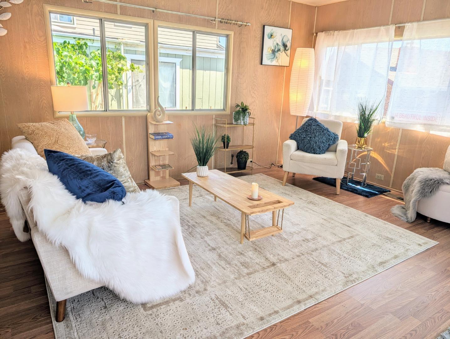 1201 Sycamore Terrace, Unit 148 Sunnyvale, CA 94086 - Photo 16 of 36 a living room with furniture and a window