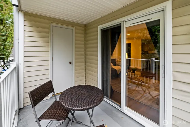 front view of a house with a tree
