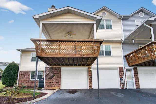 a view of a balcony with wooden floor