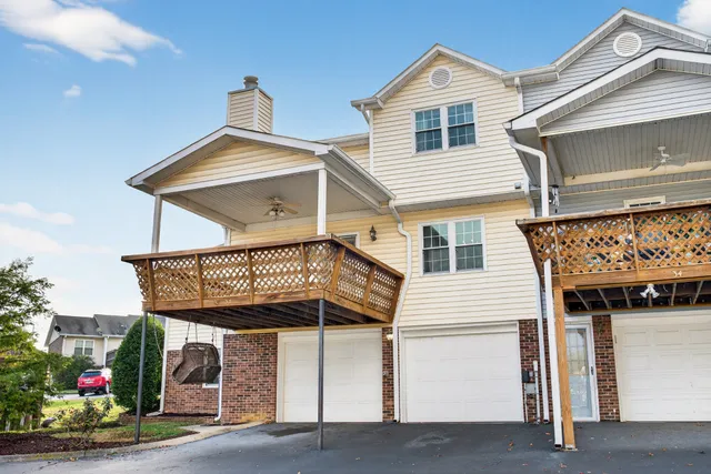 a view of a hallway view with staircase