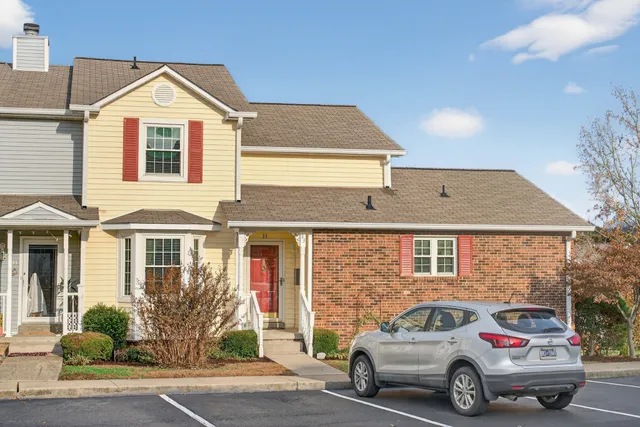 a car parked in front of a house