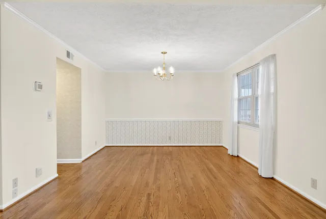 a view of a deck with wooden floor and flat screen tv