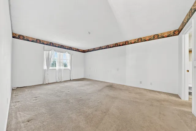 a bathroom with a sink mirror toilet and bathtub