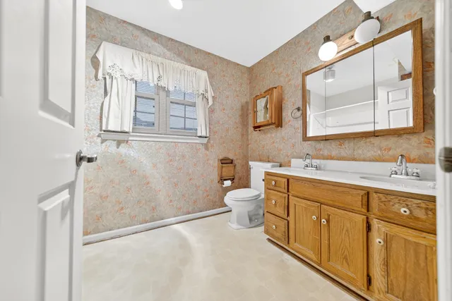 a view of a livingroom with a staircase