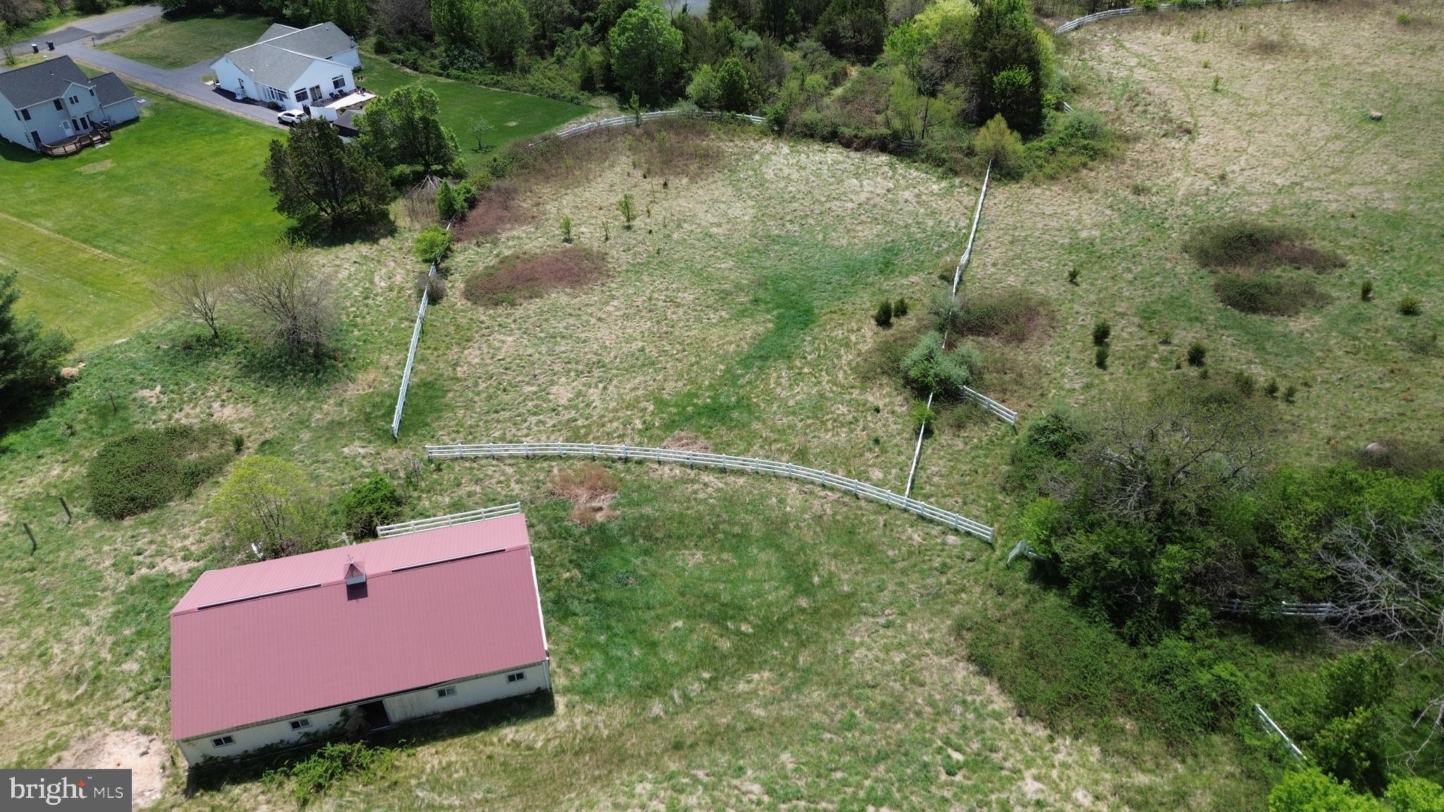 6717 Catlett Road Bealeton, VA 22712 - Photo 6 of 10 an aerial view of a house with a yard