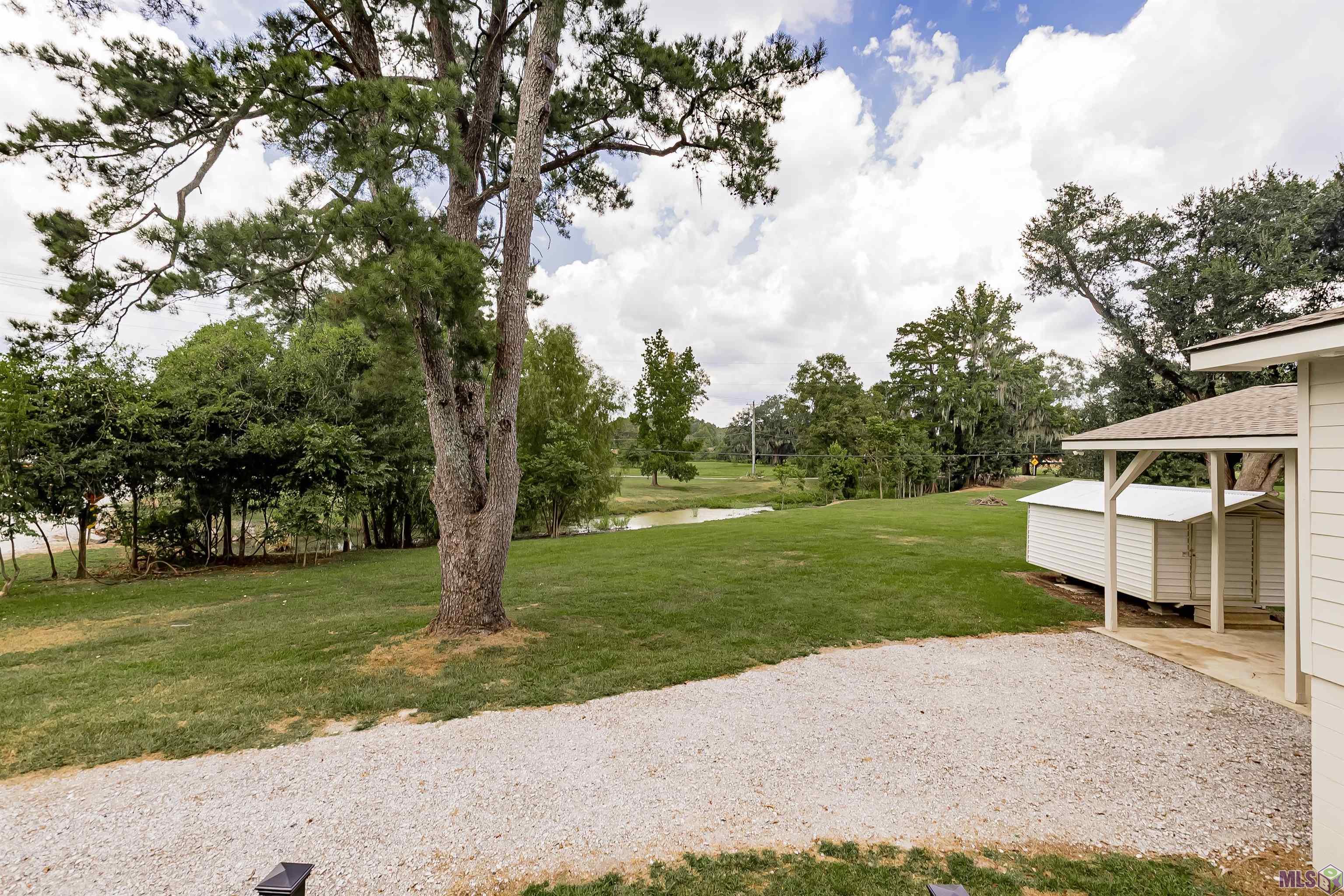 11233 Stringer Bridge Road St. Amant, LA 70774 - Photo 4 of 24