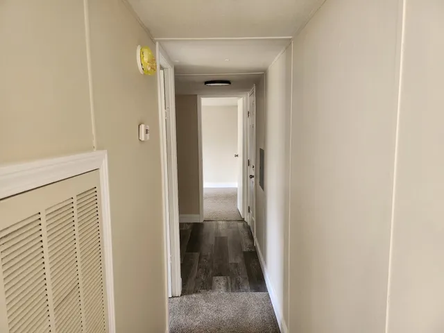 a view of a hallway with a small space