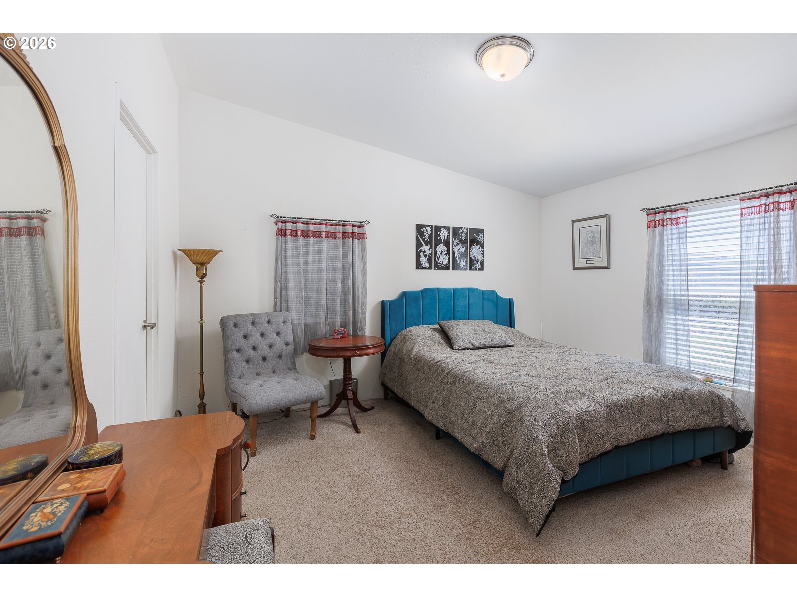 2018 Northwest Oceanic Loop Waldport, OR 97394 - Photo 15 of 35 a bedroom with a bed and a couch