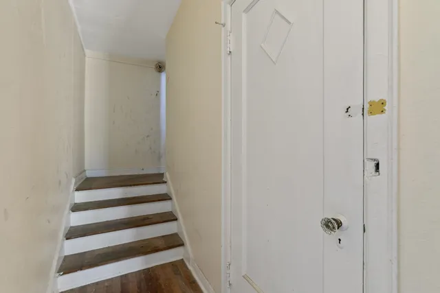 a bathroom with a sink a mirror and a shower
