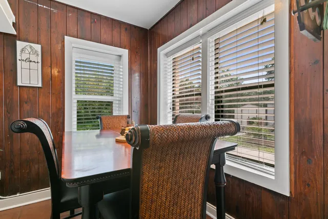 a kitchen with stainless steel appliances granite countertop a refrigerator and a stove
