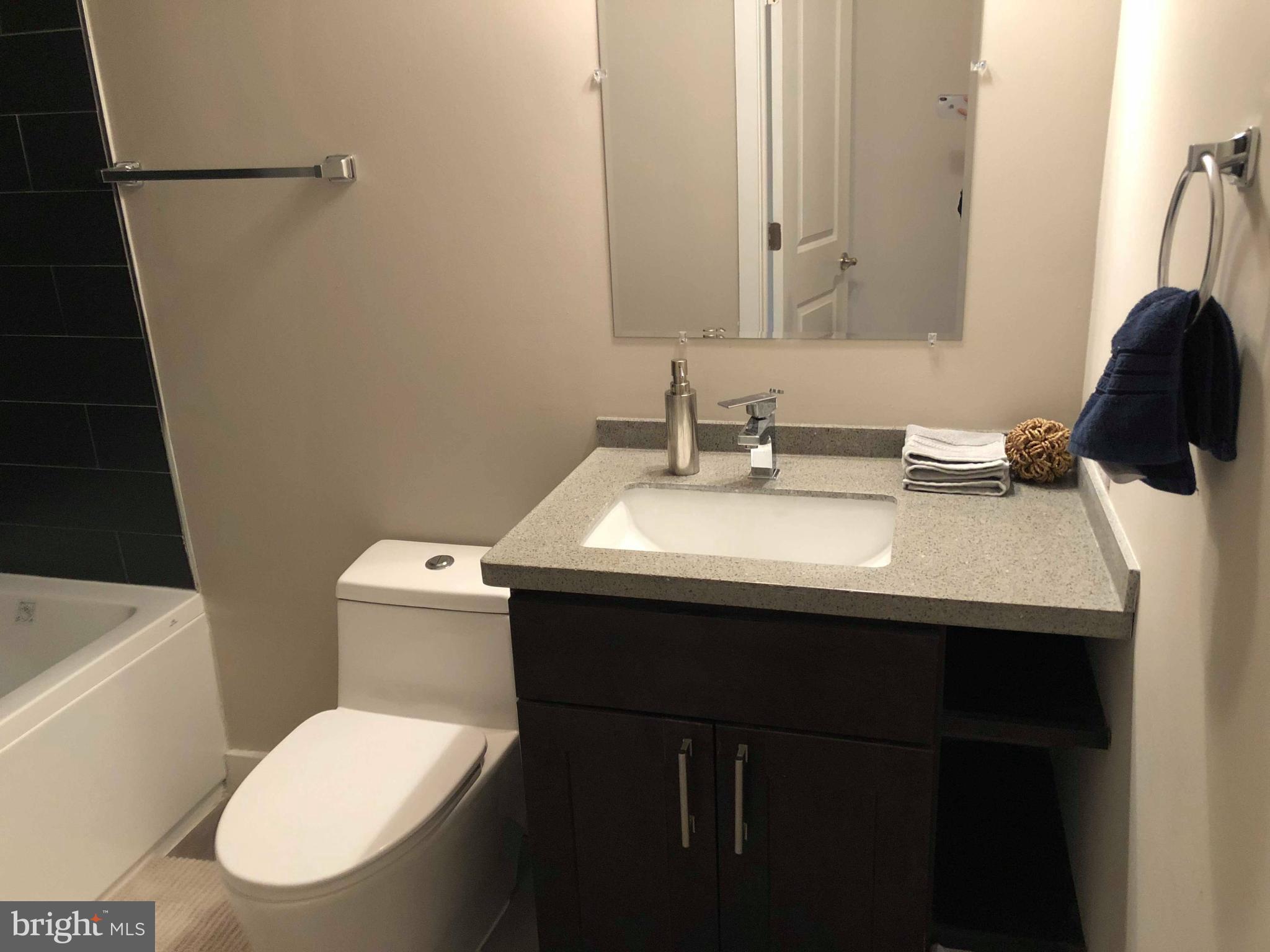 1636 Ridge Avenue, Unit 2 Philadelphia, PA 19130 - Photo 4 of 11 a bathroom with a sink and a toilet