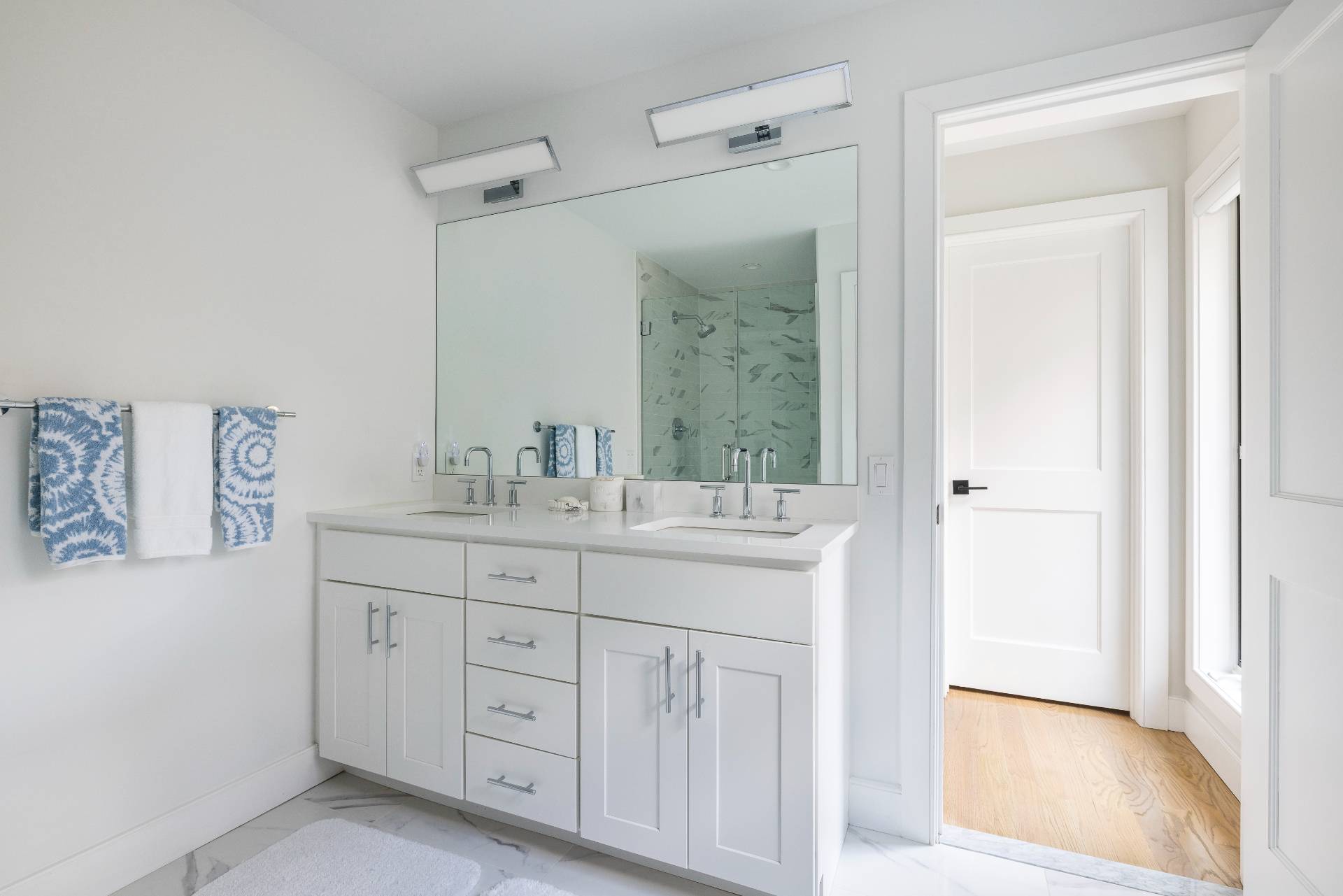 4 Camberly Road East Hampton, NY 11937 - Photo 11 of 18 a bathroom with a granite countertop sink and a mirror
