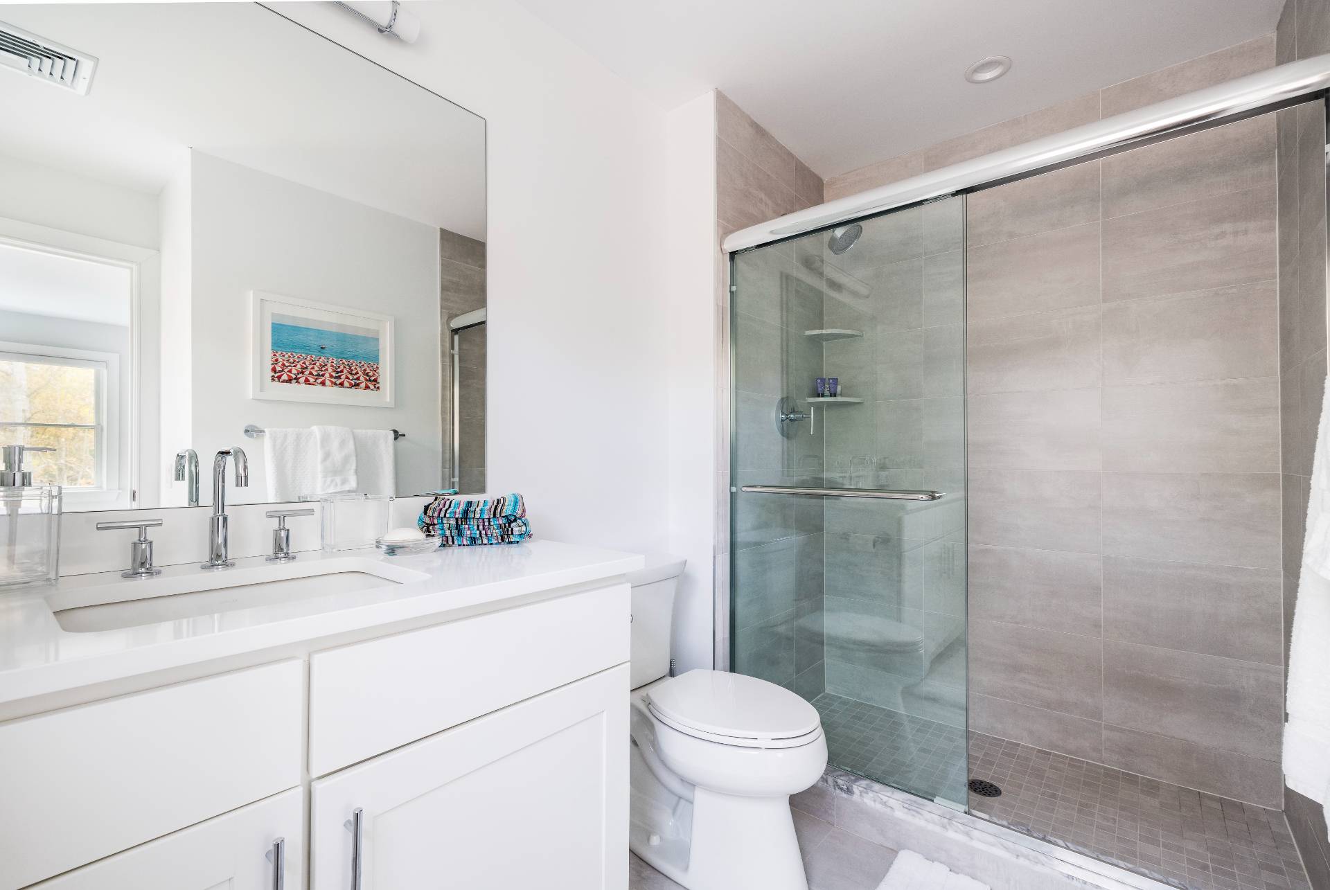 4 Camberly Road East Hampton, NY 11937 - Photo 12 of 18 a bathroom with a sink toilet and shower