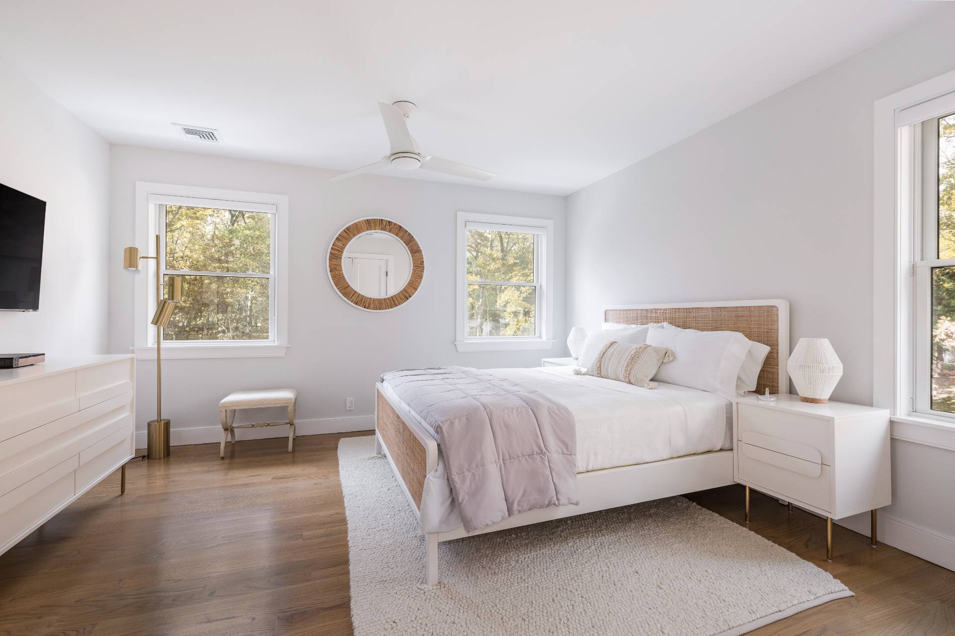 4 Camberly Road East Hampton, NY 11937 - Photo 13 of 18 a bedroom with a bed and a large window