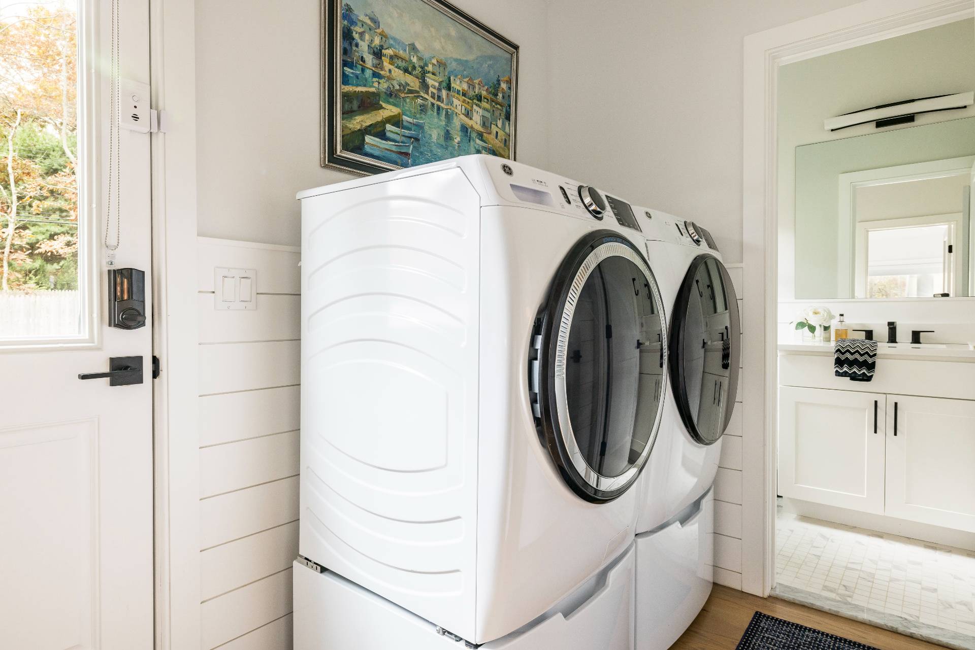 4 Camberly Road East Hampton, NY 11937 - Photo 18 of 18 a utility room with dryer and washer