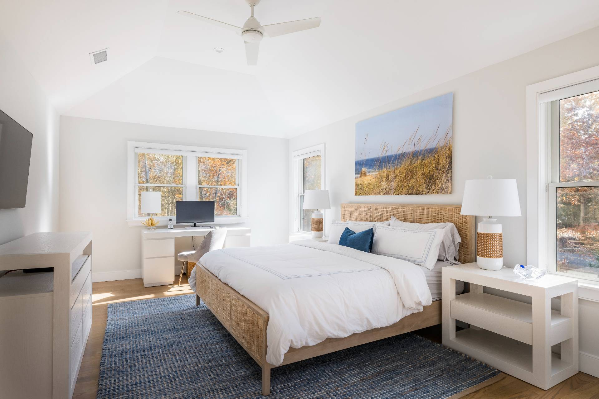 4 Camberly Road East Hampton, NY 11937 - Photo 10 of 18 a bedroom with a bed and a large window