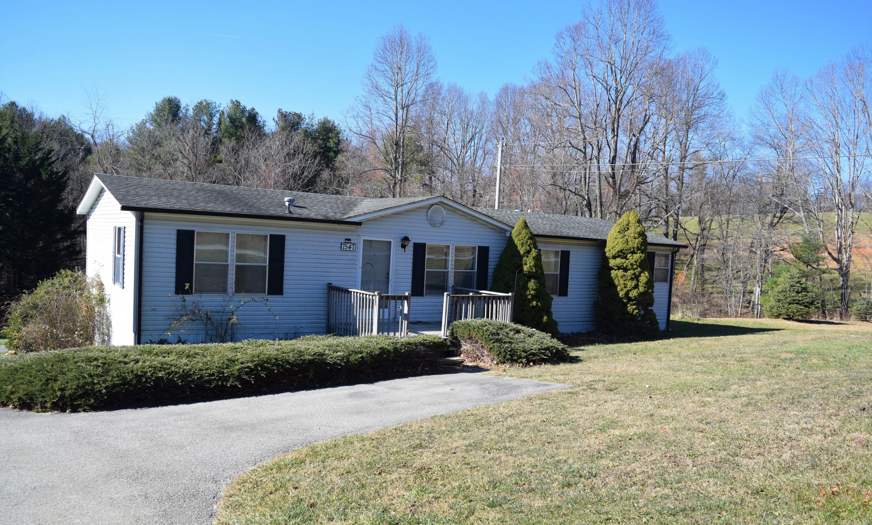 7547 Conner Road Northeast Copper Hill, VA 24079 - Photo 3 of 27 a front view of a house with a yard
