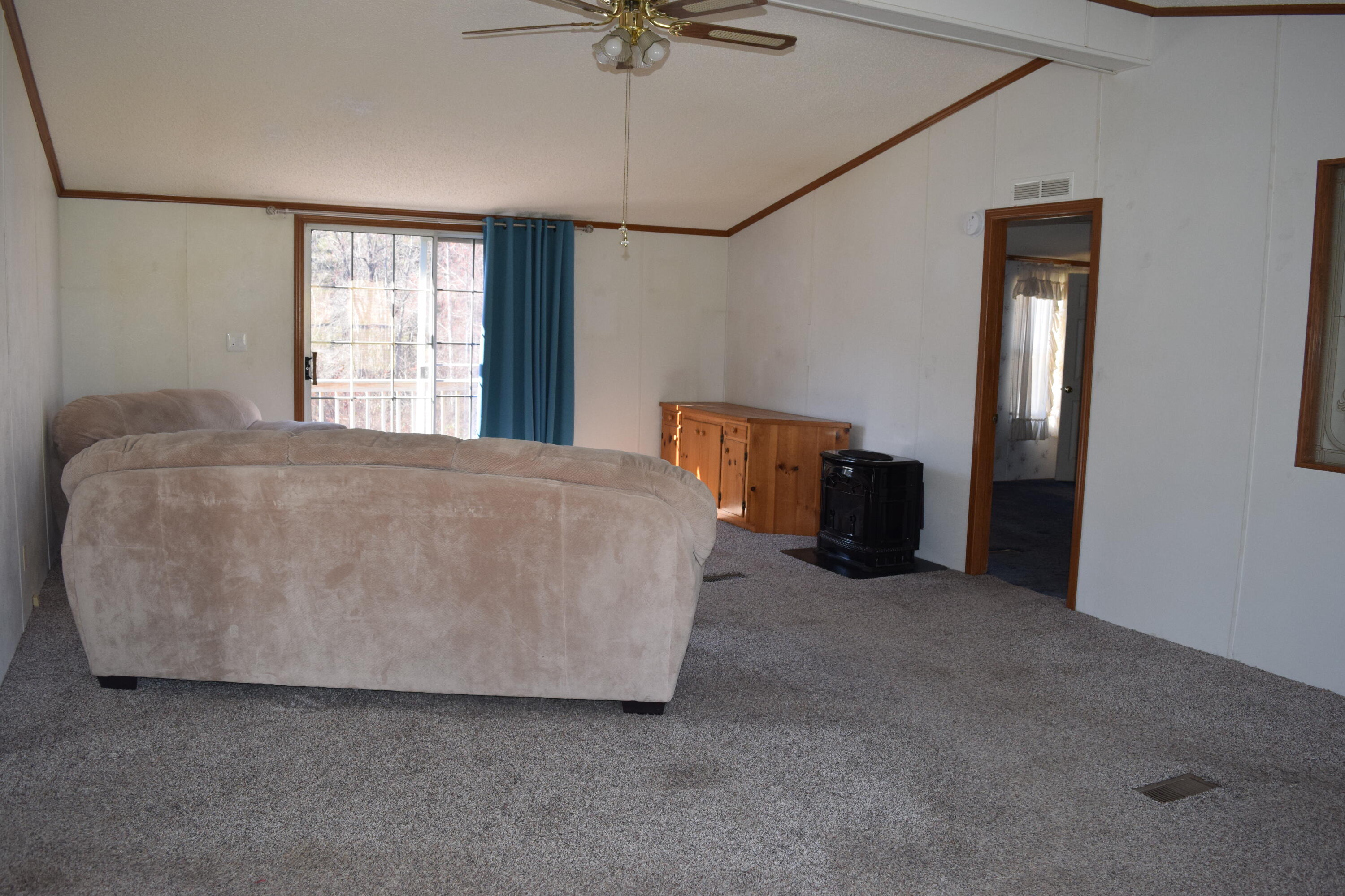 7547 Conner Road Northeast Copper Hill, VA 24079 - Photo 7 of 27 a living room with furniture and window