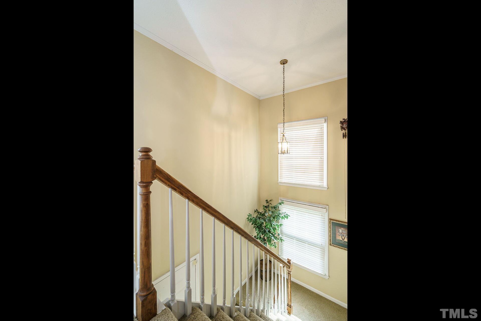 709 Broad Leaf Circle, Unit 709 Raleigh, NC 27613 - Photo 4 of 22 a view of a balcony