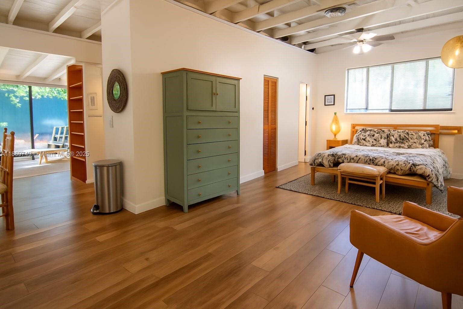3164 Center Street Miami, FL 33133 - Photo 10 of 15 a living room with furniture and wooden floor