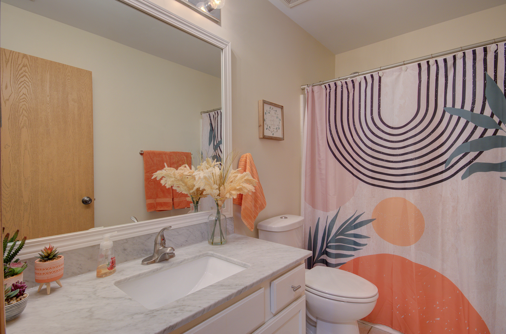 1504 Bluestem Lane Minooka, IL 60447 - Photo 24 of 27 a bathroom with a sink a toilet and a mirror