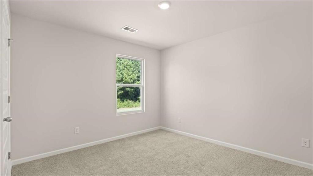 143 Defilippe Drive Statham, GA 30666 - Photo 32 of 56 an empty room with a window
