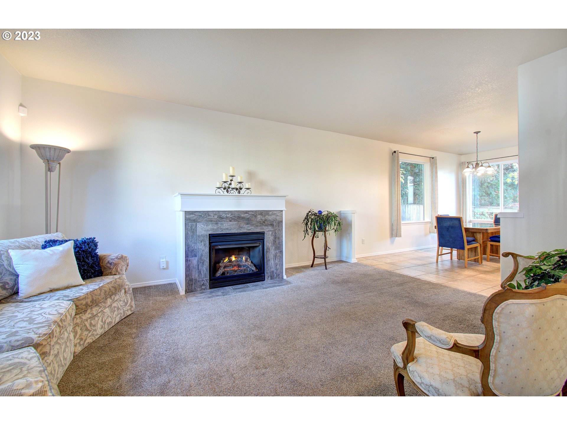 4762 Southeast 20th Terrace Gresham, OR 97080 - Photo 14 of 34 a living room with furniture and a fireplace