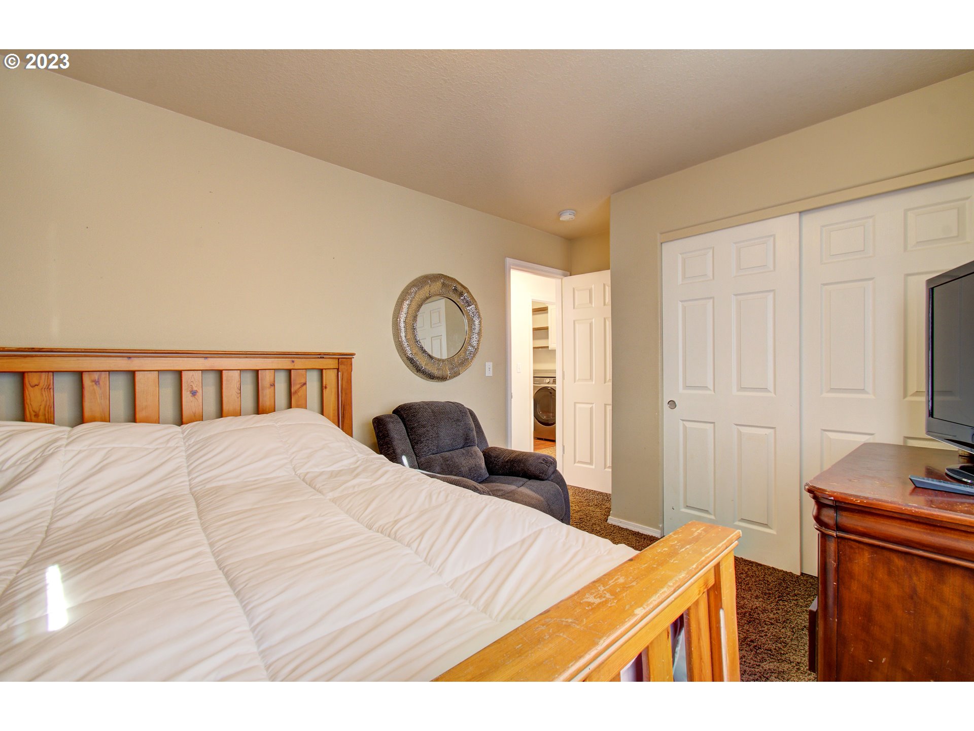4762 Southeast 20th Terrace Gresham, OR 97080 - Photo 24 of 34 a bedroom with a bed and a closet