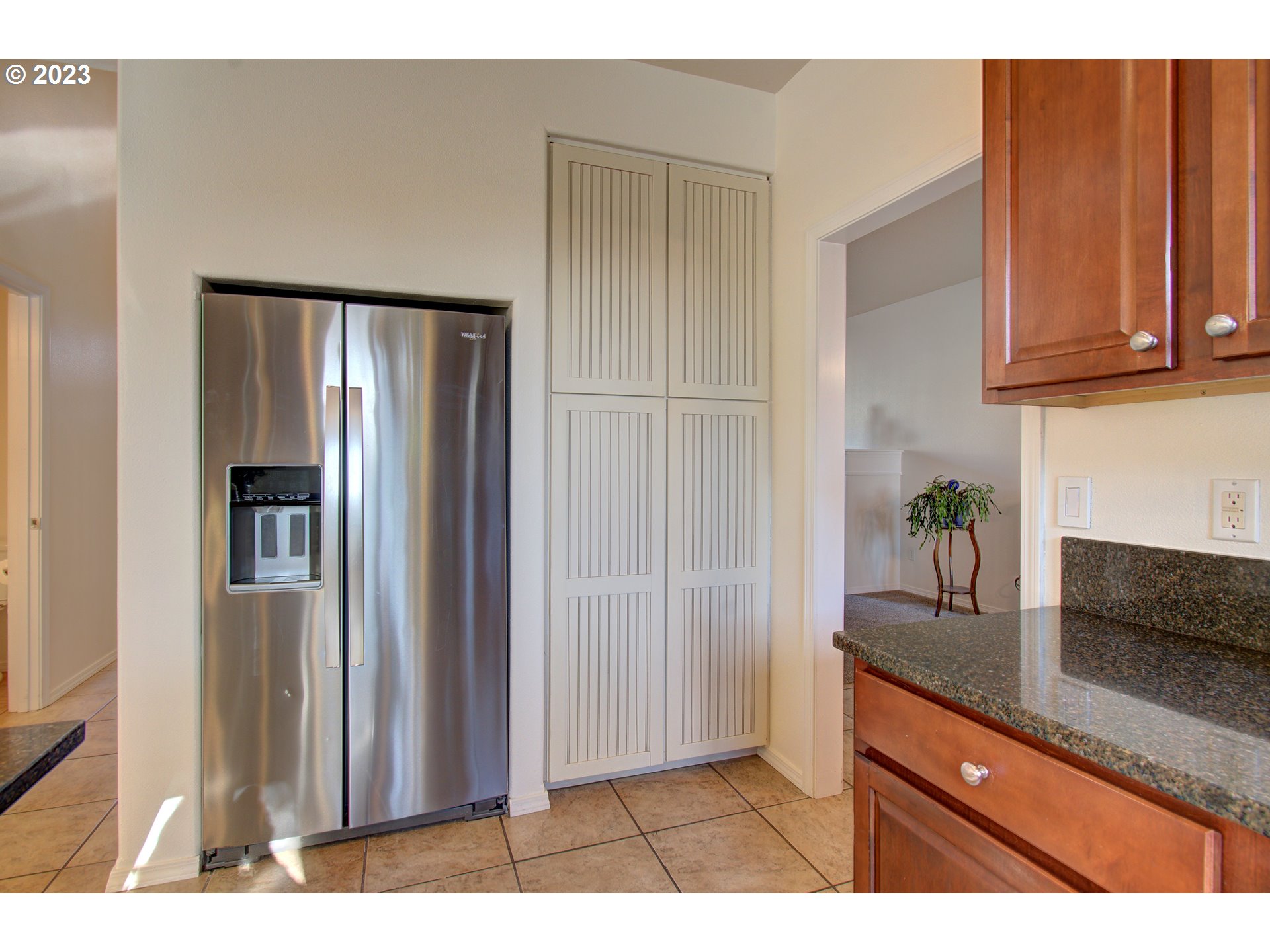 4762 Southeast 20th Terrace Gresham, OR 97080 - Photo 9 of 34 a kitchen with stainless steel appliances granite countertop a refrigerator and a sink