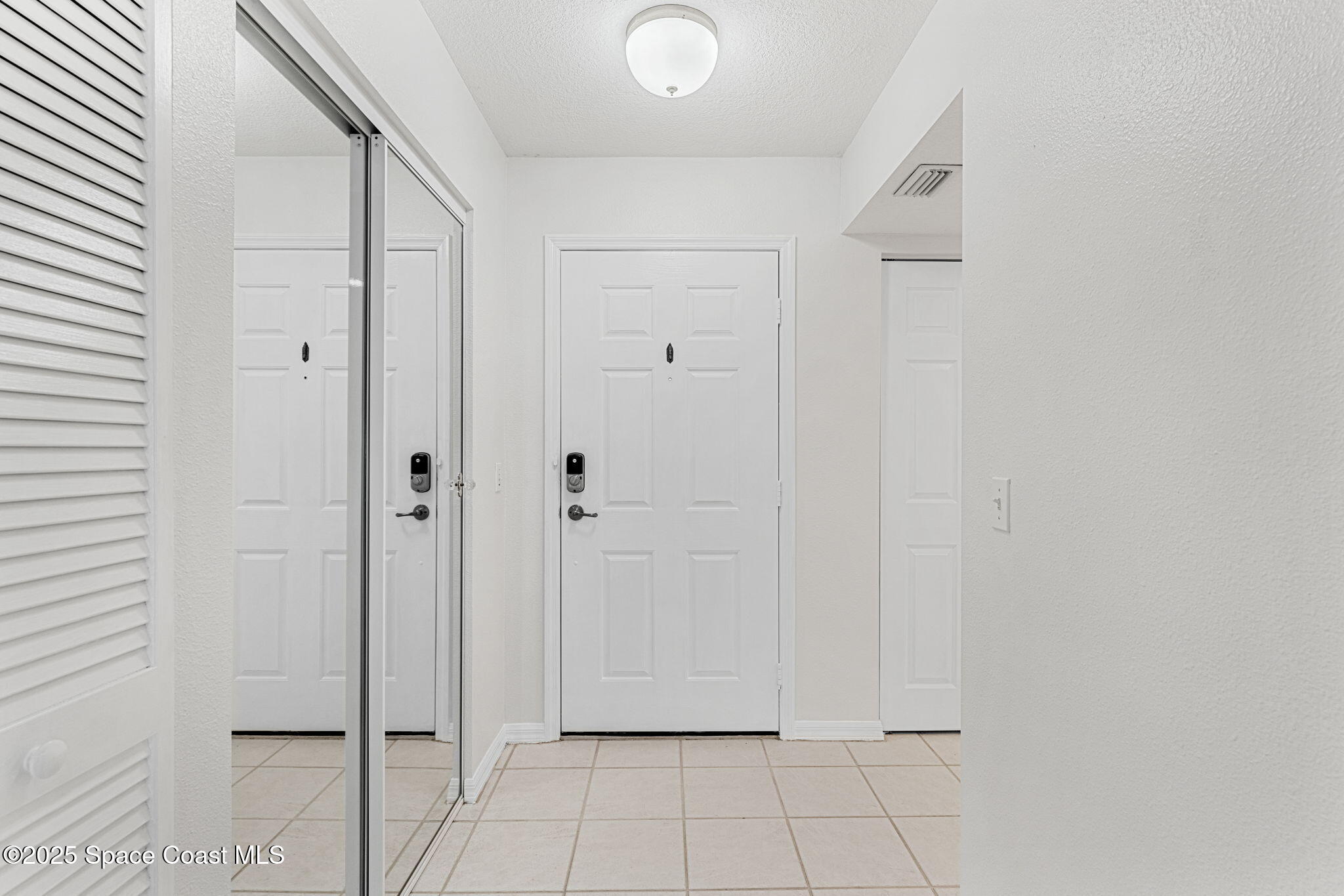 104 Riverside Drive, Unit 301 Cocoa, FL 32922 - Photo 7 of 93 Foyer Views