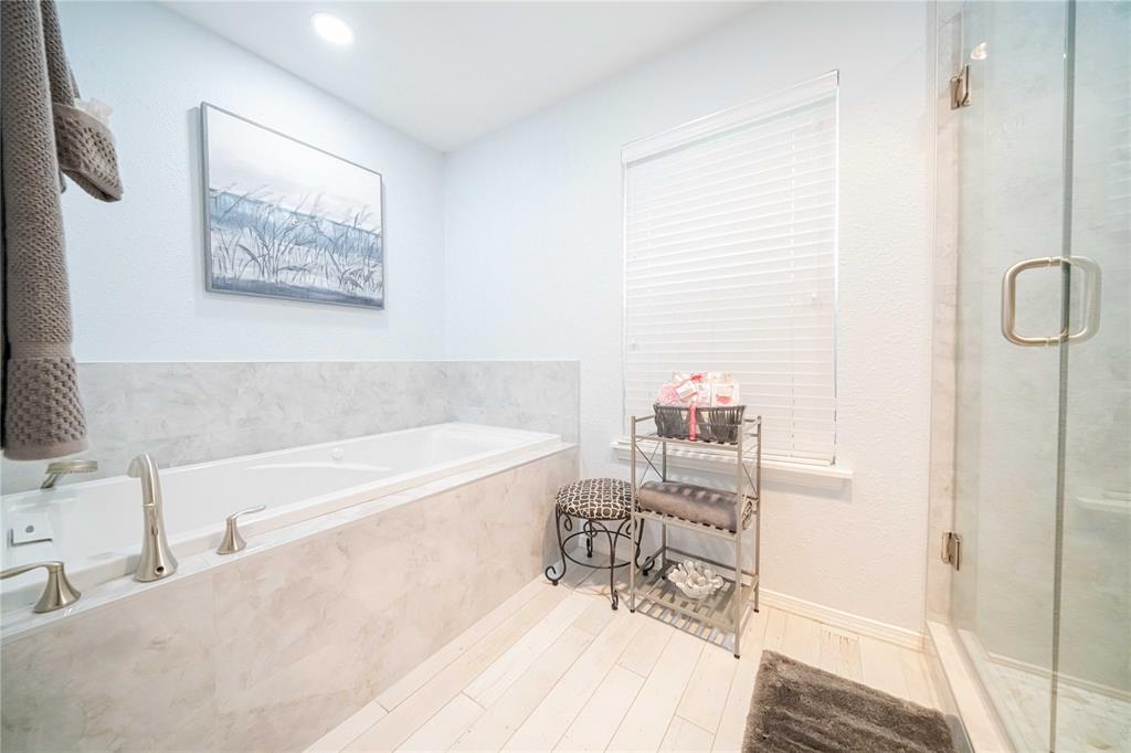 919 Green Hills Road Duncanville, TX 75137 - Photo 20 of 37 Full bathroom featuring a bath and a shower stall