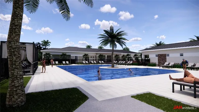 a swimming pool with outdoor seating and yard