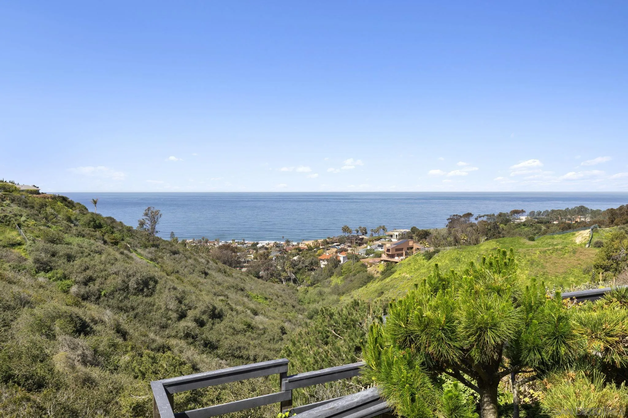 a view of a city with ocean